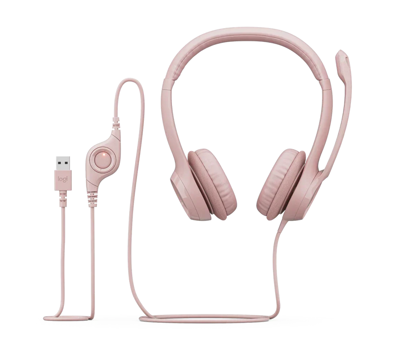 Pink wired headset with USB connector and adjustable microphone on white background
