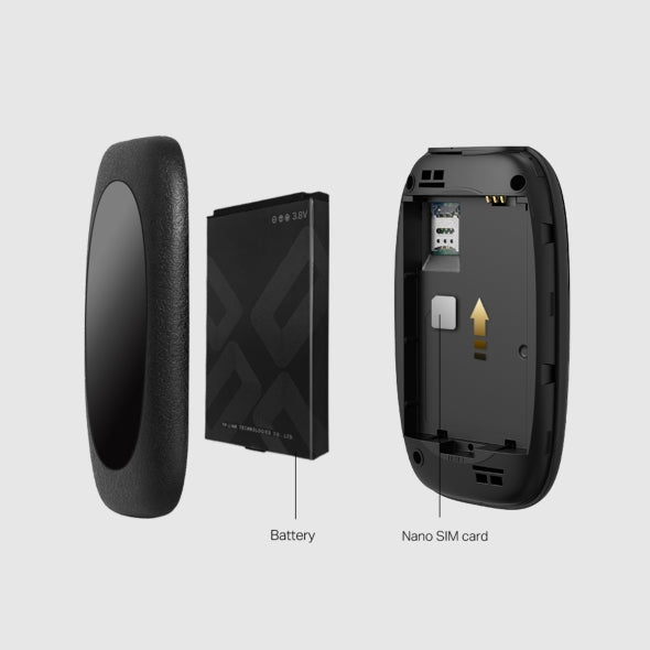 Disassembled black handheld device showing battery and nano SIM card slot on gray background