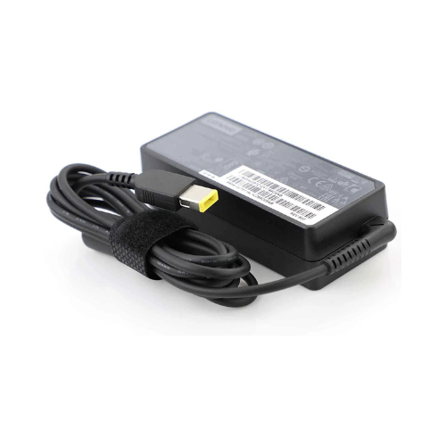 Black laptop charger with yellow rectangular connector and coiled cable on white background