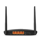 Back view of black WiFi router with dual antennas, four LAN ports, power input, and nano SIM card slot